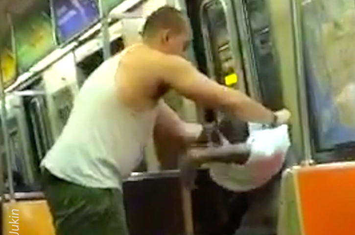 Man on Subway Gives Homeless Man Shirt Off His Back